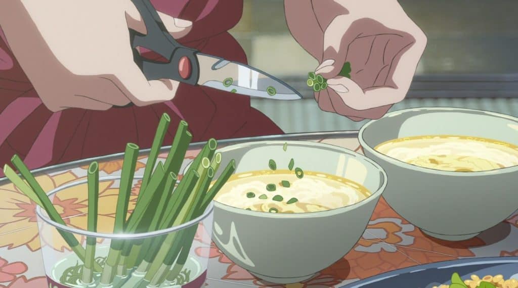 comida sendo preparada por hina no filme de makoto shinkai