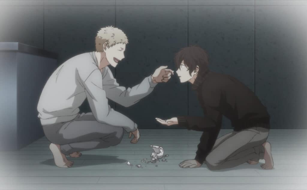 Akihiko pegando os pedaços da xicára que o Uenoyama quebrou