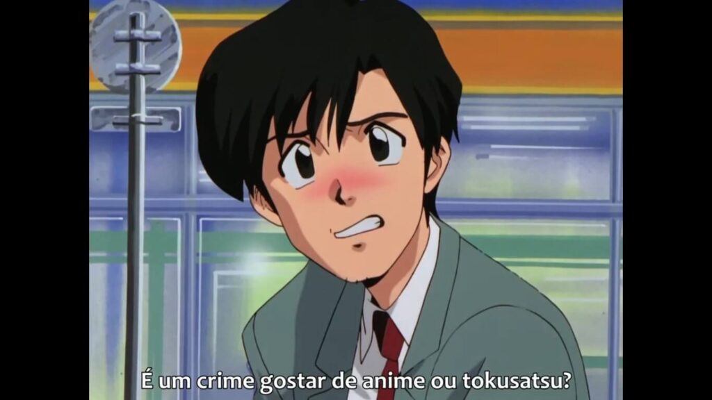 Cena do OVA Otaku no Video com a pergunta "é um crime gostar de anime ou tokusatsu?"