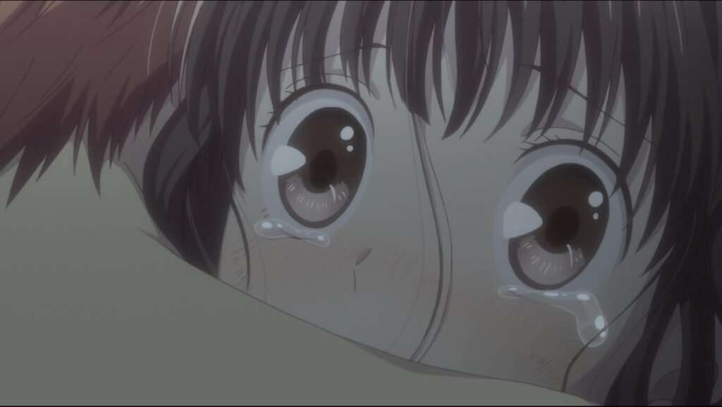 Tooru abraçando Kyo e com olhos cheios de lágrimas